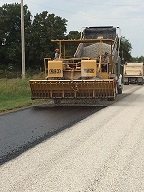 Machine doing road work