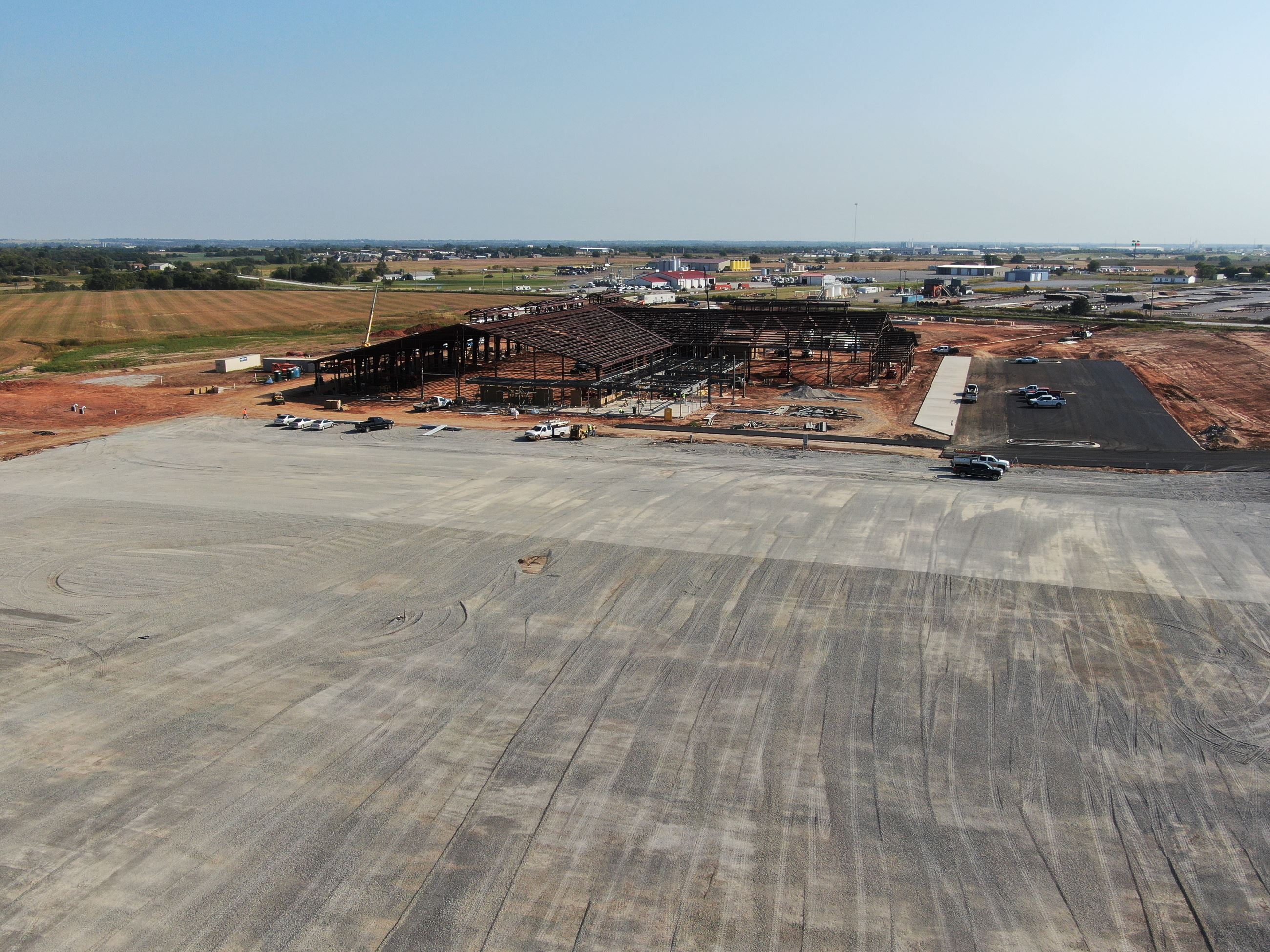 Drone shot looking North East over future vendor parking, which has been graveled in this picture.